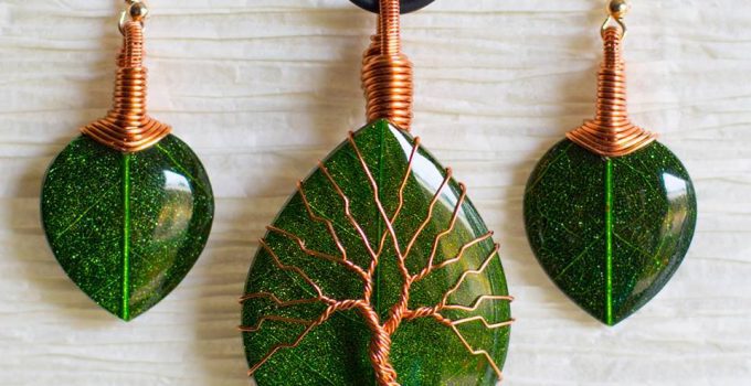 Discarded Copper Wire Twisted into Trees to Beautifully Frame Dazzling Stone Pendants