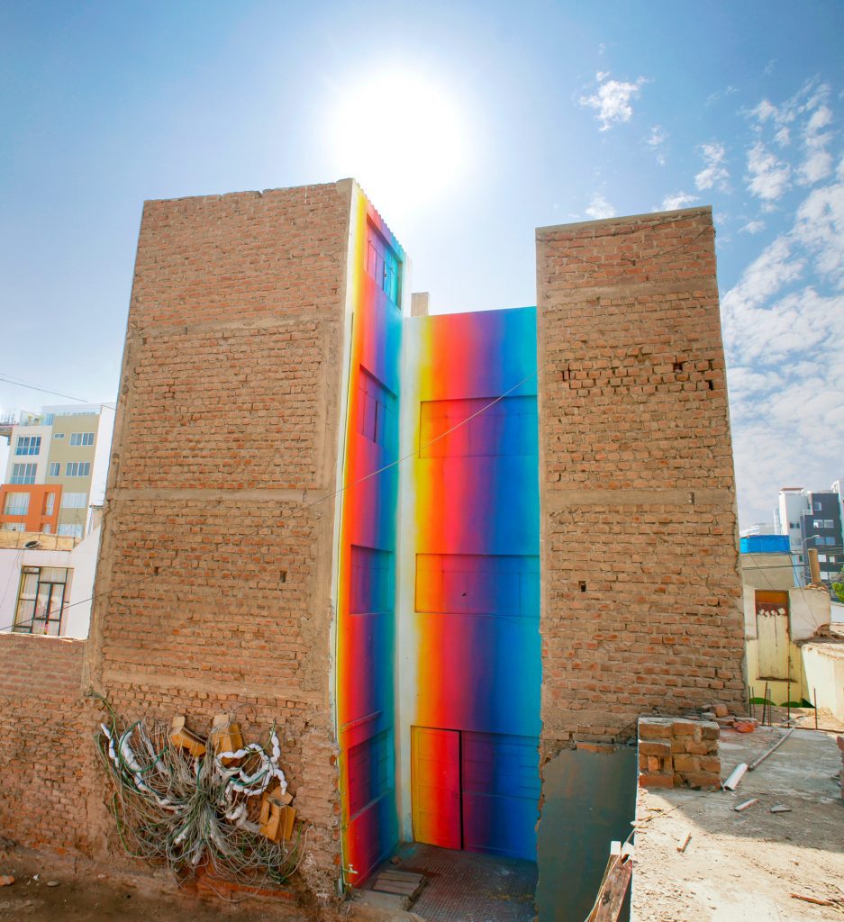 murals by xomatok cover the streets of lima with bursts of color